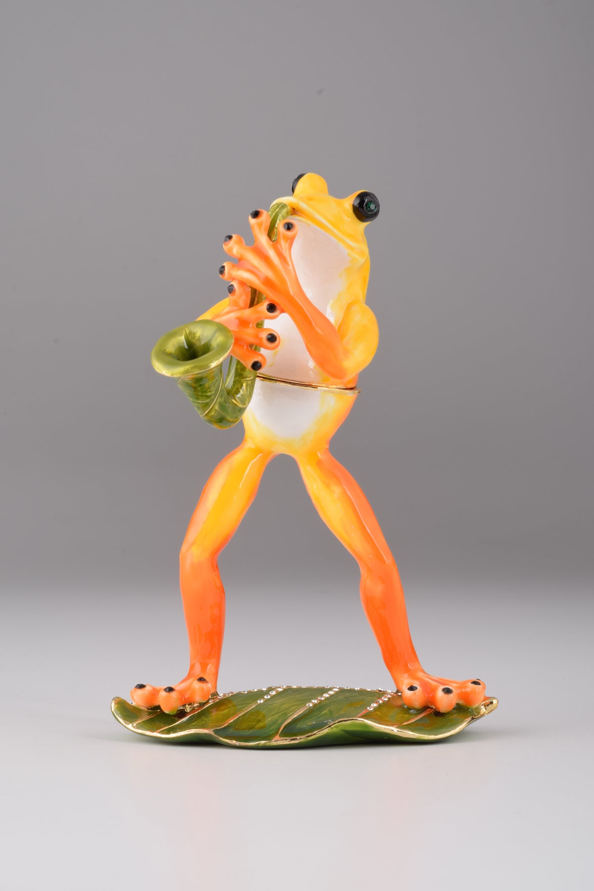 Keren Kopal Frog Playing a Saxophone