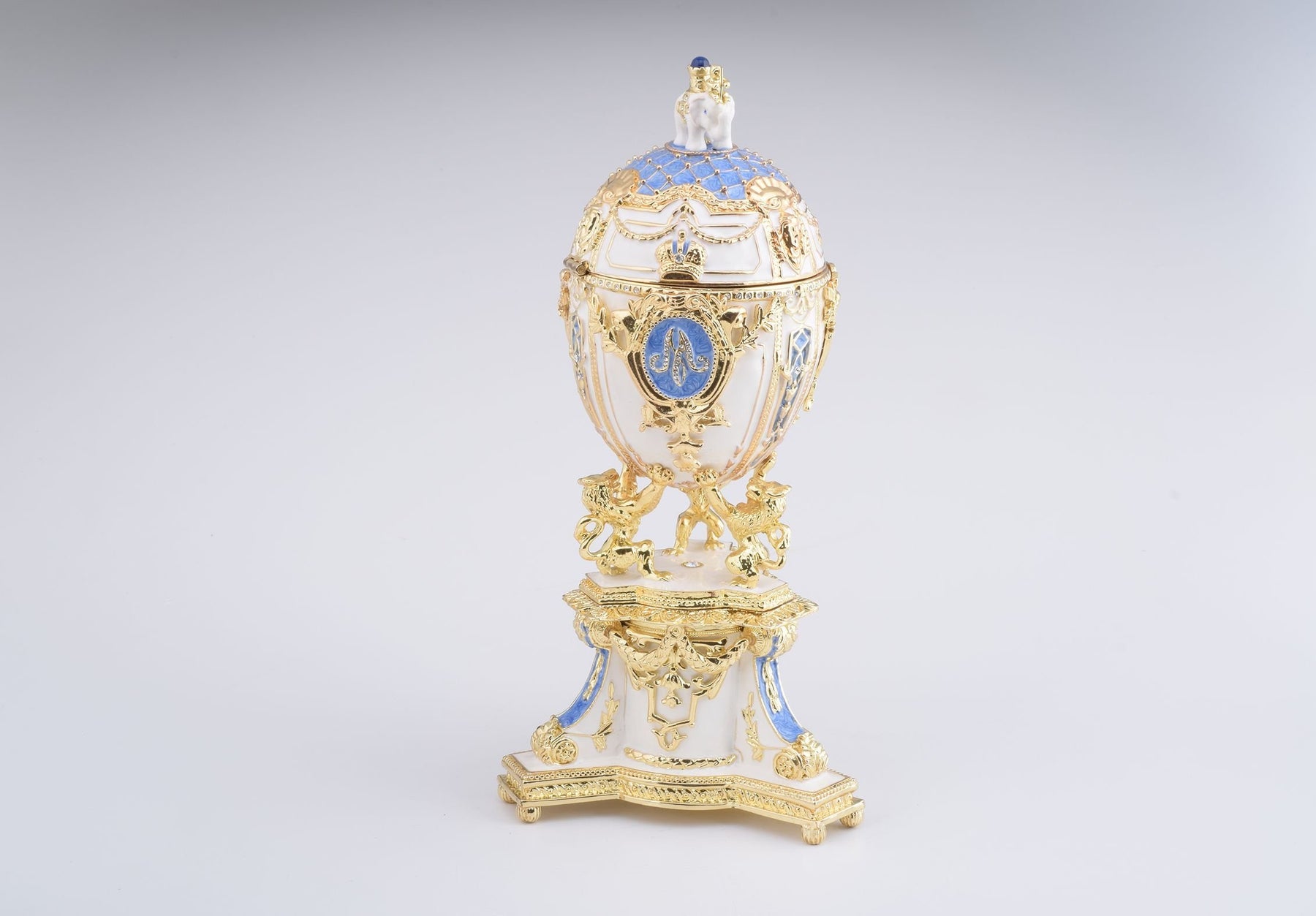 Keren Kopal White Faberge Egg with an Elephant on Top
