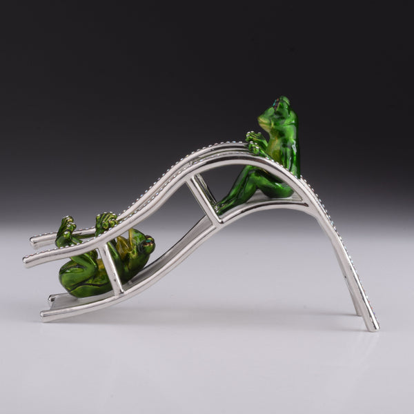 Two Frogs Riding Slide