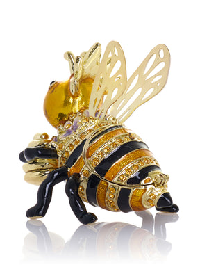 מלכת הדבורים מחזיקה כוורת – קופסת תכשיטים