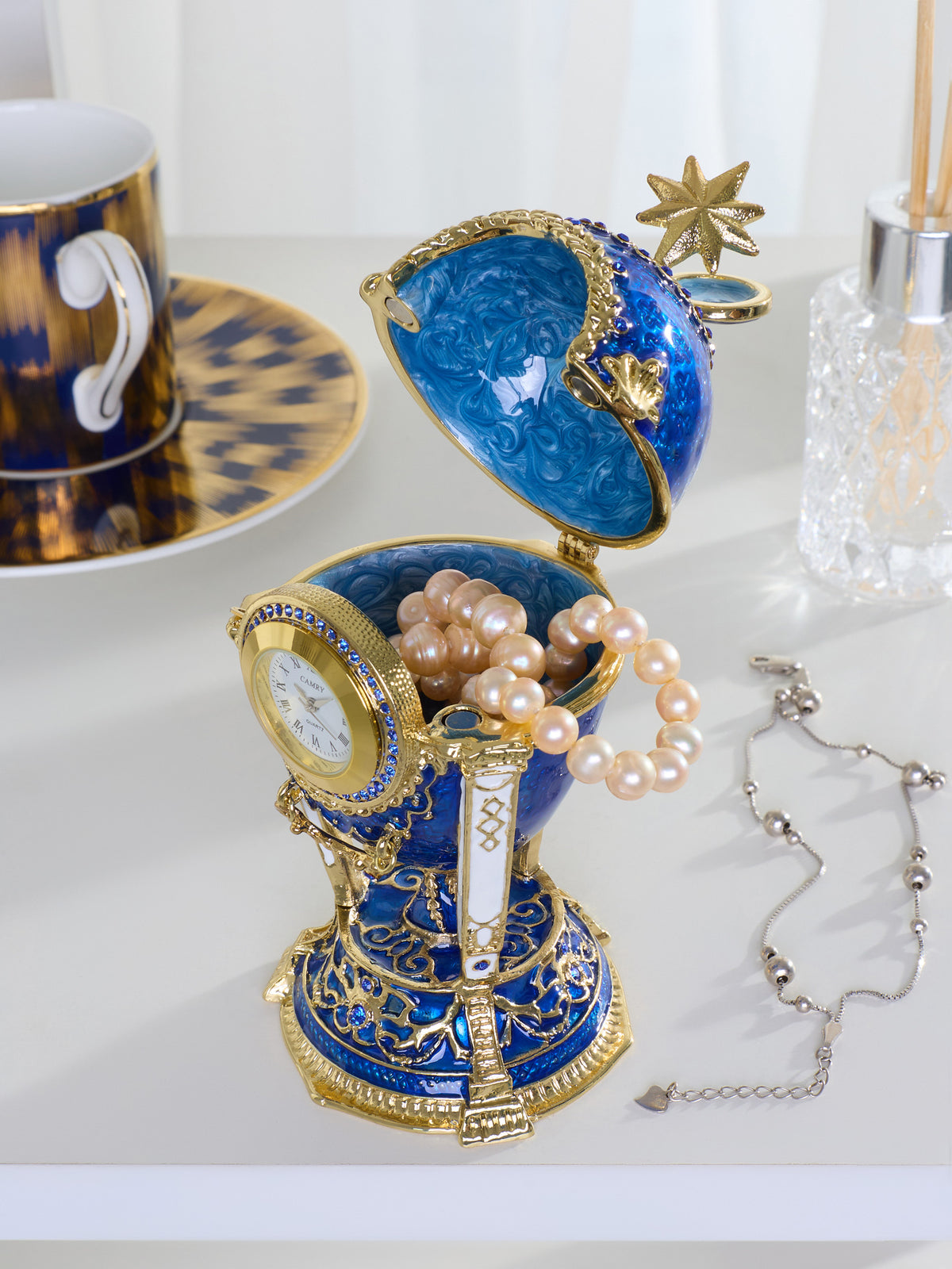 Königsblaues & Goldenes Uhr-Ei Schmuckkästchen im Fabergé-Stil mit Geheimfach & abnehmbarem Stern