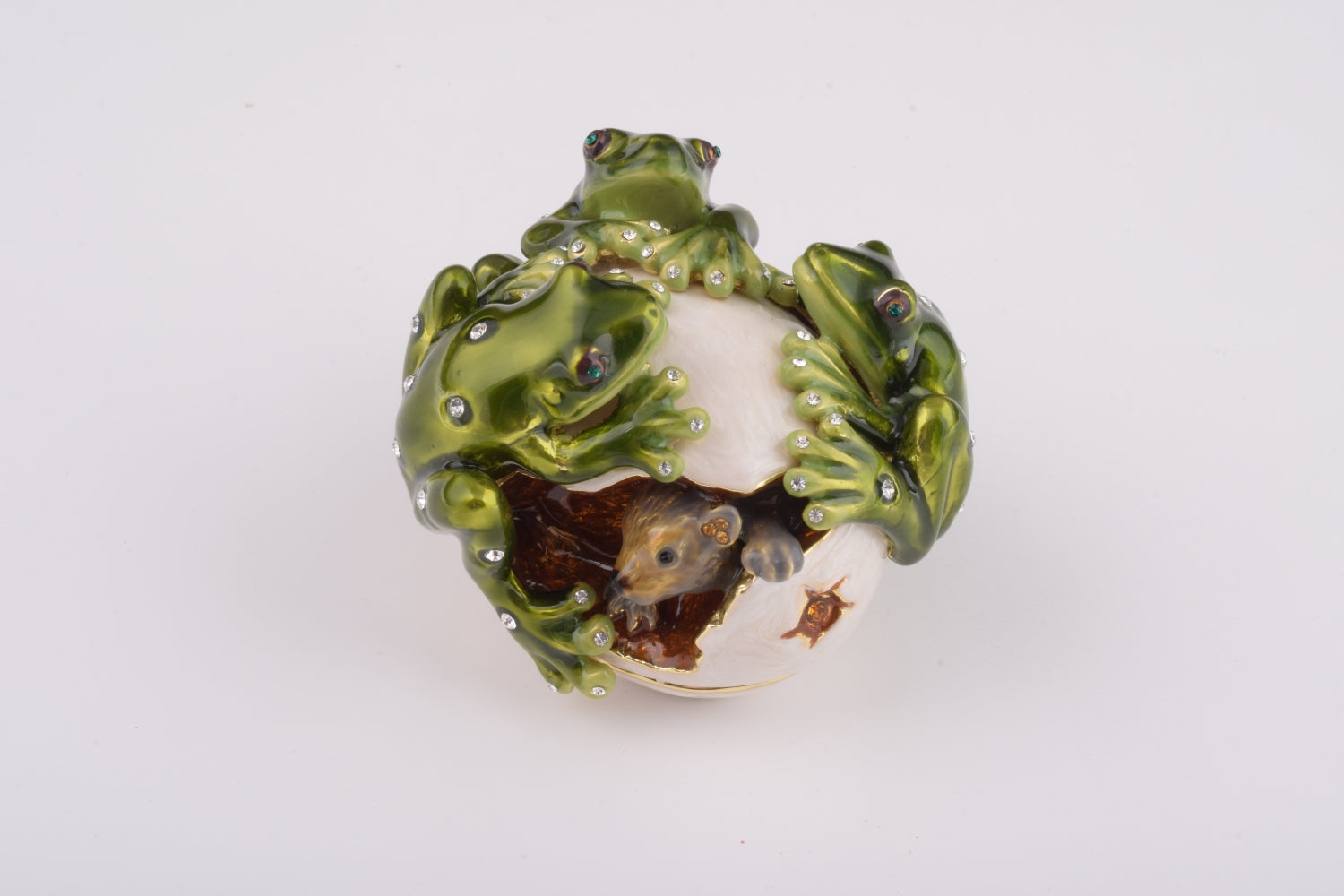 Frogs on white Egg including hidden mouse