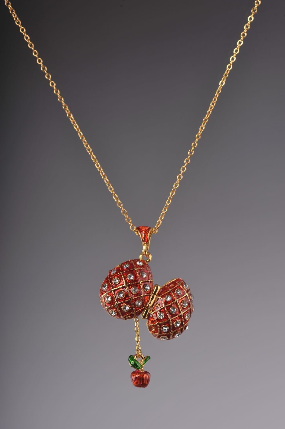 Keren Kopal Red Egg Pendant with a Surprise Apple Inside  36.00